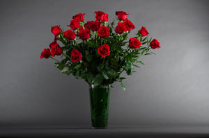 Two Dozen Roses in a Vase